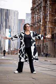 Marketing Consultation - standing with both arms out in manchester - small for website